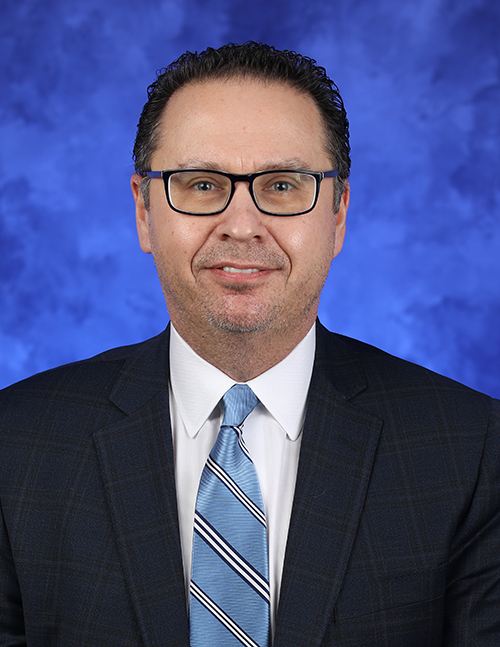 A head-and-shoulders portrait of Brian Spector, MPA