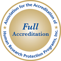 A round logo shows the words Association for the Accreditation of Human Research Protection Programs, Inc. around the outside and the words Full Accreditation in larger text inside the circle.