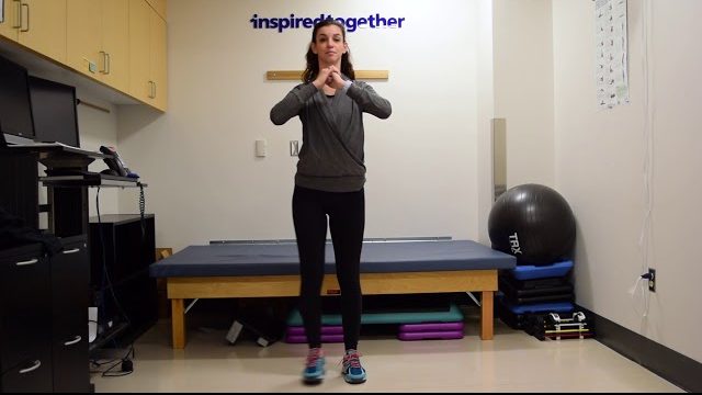 A still from a video shows a person performing the Side Lunges exercise.