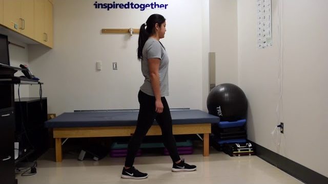 A still from a video shows a person performing the Single-Leg Romanian Dead Lift (RDL) exercise.